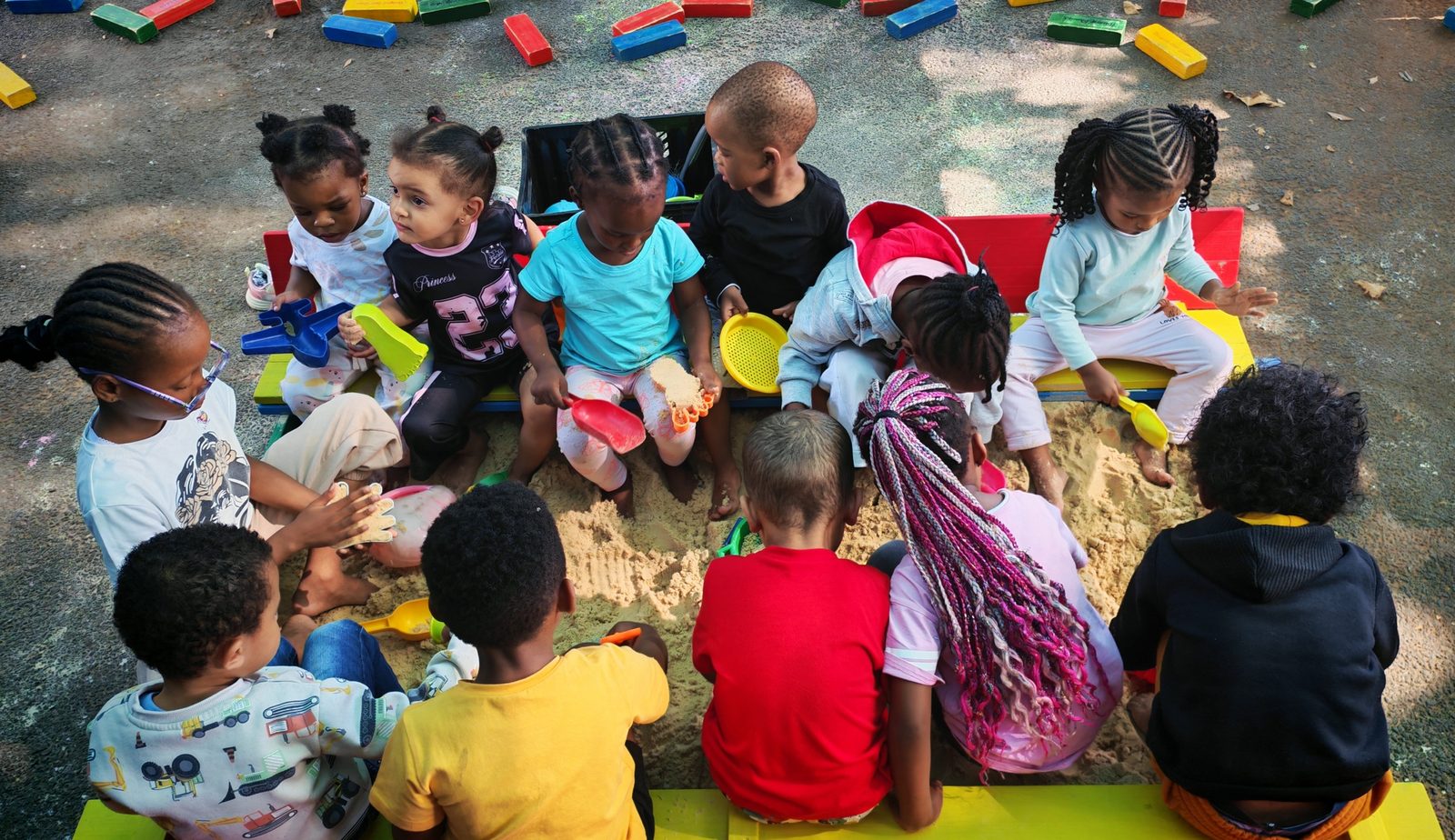 Children enjoying outdoor activities at Ladybuggz Preschool